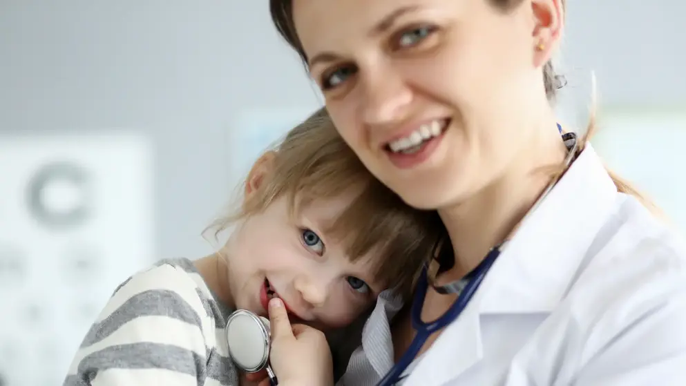 Improving treatment options for child psoriasis banner image, child and doctor