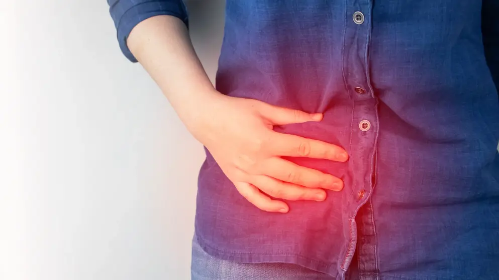 AdobeStock_358278814 Woman with gut pain